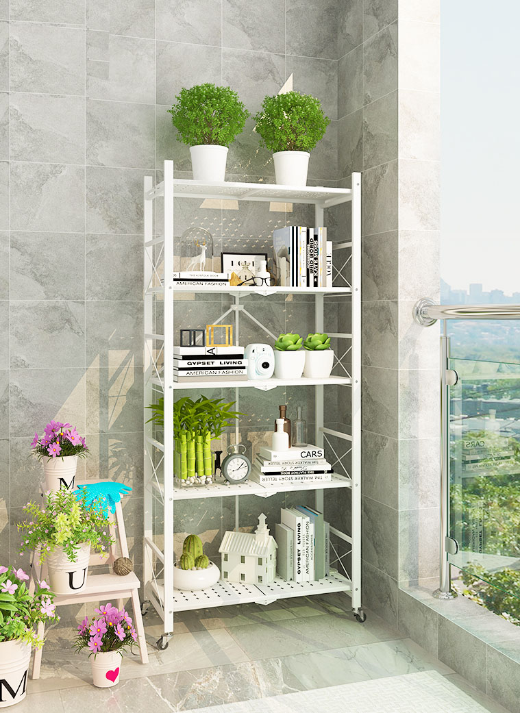 Black foldable rack standing on a balcony holding plants and household items
